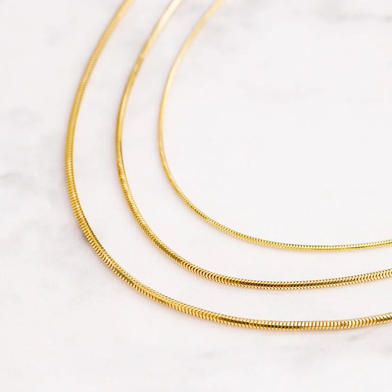 Classic Couples Men Women Gold Color Bracelets for Women Stainless Steel Thin Snake Link Chain Lobster Clasp Snap Button Jewelry