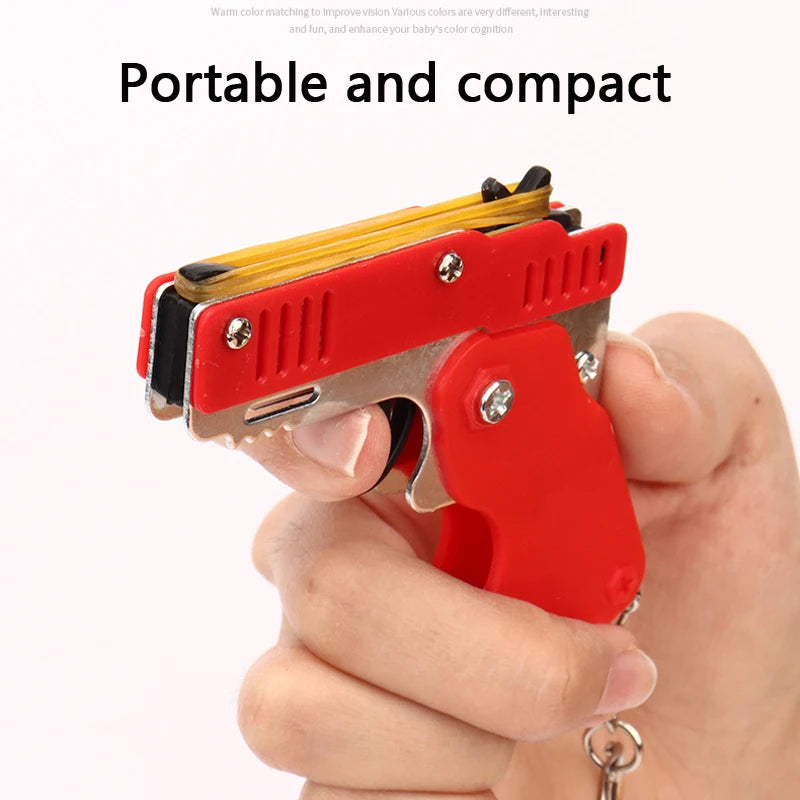 1PCS keychain gun 60 rubber bands rubber band gun Shooting Pistol Alloy Kid Outdoor Party metal gun gift boyfriend Gift Funny